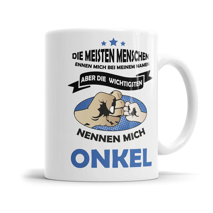 Onkel Tasse mit Familienspruch und Fäuste