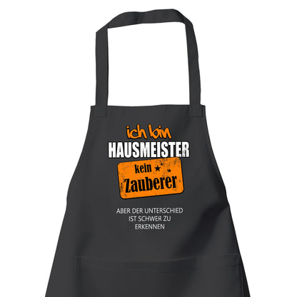 Ich bin Hausmeister kein Zauberer - Schürze Schwarz - Fulima